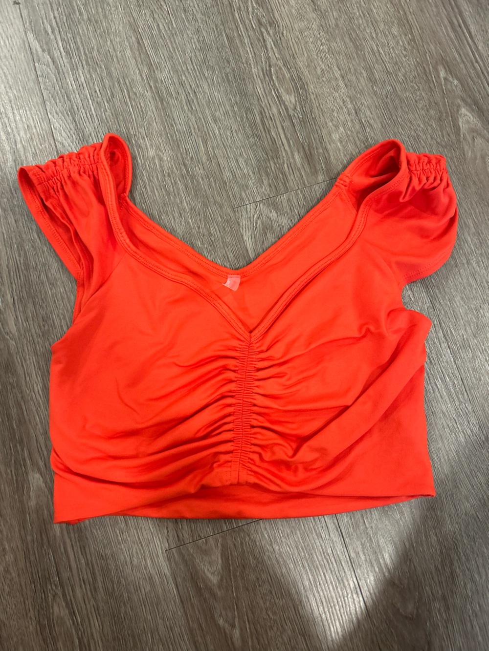 FP Movement by Free People Bright Orange Ruched V-Neck Crop Top